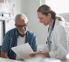 doctor shows patient paperwork